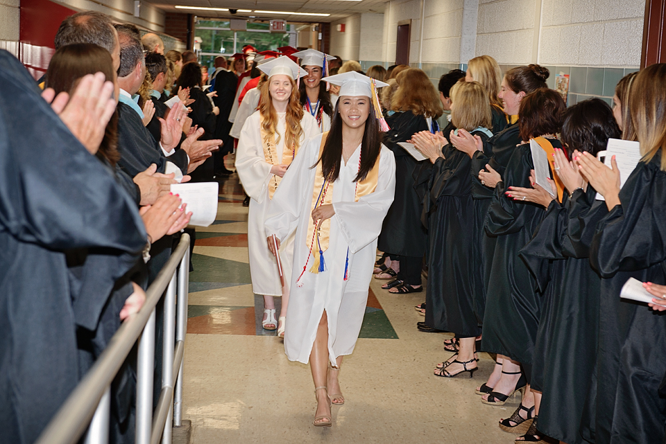 Class Valedictorian And Salutatorian Lead Recent Grads Through Tunnel